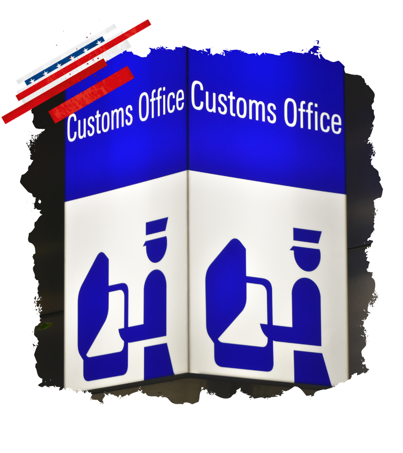 Am blau-weißen Customs Office Schild sind zwei Grenzbeamten-Symbole zu sehen, passend zu Einreise- und Zollkontrolle in den USA.